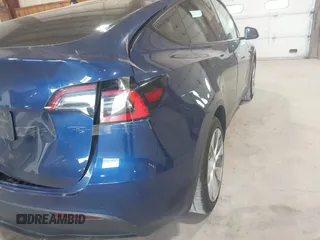 2021 Tesla Model Y Long Range with VIN 5YJYGDEE7MF066269, listed as a IAAI auction lot 42170970 with 70,170 mi miles. Bid and sale history available at carsss.com. Image 21.