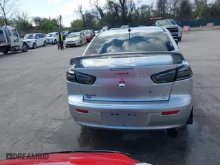 2017 Mitsubishi Lancer ES with VIN JA32V2FW9HU000485, listed as a IAAI auction lot 42019371 with 101,922 mi miles. Bid and sale history available at carsss.com. Image 16.