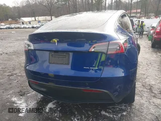 2024 Tesla Model Y Long Range with VIN 7SAYGDEE1RA319271, listed as a IAAI auction lot 41530466 with 7,934 mi miles. Bid and sale history available at carsss.com. Image 16.
