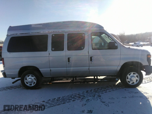2012 Ford Econoline Passenger XL z VIN 1FMNE1BW4CDA93080, wystawiony jako IAAI lot #41103198 z przebiegiem Nie podano mil oraz . Historia ofert i sprzedaży dostępna na DreamBid. Obrazek 13.