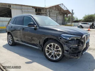 2019 BMW X5 xDrive40i with VIN 5UXCR6C50KLL21212, listed as a Copart auction lot 51939165 with 49,973 mi miles and Salvage Title. Bid and sale history available at carsss.com. Image 4.