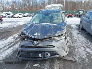 2017 Toyota RAV4 LE with VIN JTMZFREV9HJ119332, listed as a IAAI auction lot 41257790 with 94,992 mi miles and . Bid and sale history available at carsss.com. Image 12.