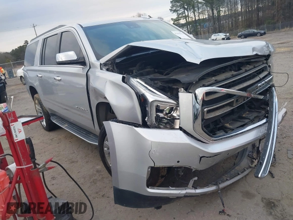 2019 GMC Yukon XL SLT with VIN 1GKS1GKC8KR383694, listed as a IAAI auction lot 41466213 with 128,368 mi miles. Bid and sale history available at carsss.com. Image 1.