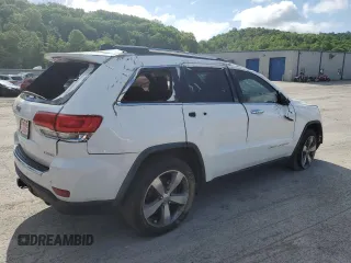 2014 Jeep Grand Cherokee Limited with VIN 1C4RJFBGXEC325357, listed as a Copart auction lot 61993715 with 156,718 mi miles and Salvage title. Bid and sale history available at DreamBid. Image 3.