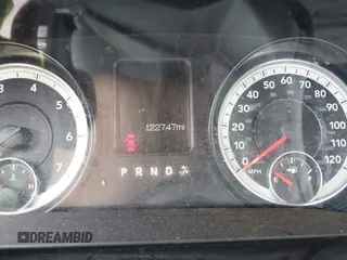 2015 Ram 1500 Tradesman with VIN 3C6JR7DTXFG637822, listed as a IAAI auction lot 40462420 with 122,747 mi miles and . Bid and sale history available at DreamBid. Image 7.