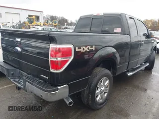 2014 Ford F-150 XL with VIN 1FTFX1EF9EFA08353, listed as a IAAI auction lot 41064612 with 140,025 mi miles. Bid and sale history available at carsss.com. Image 4.