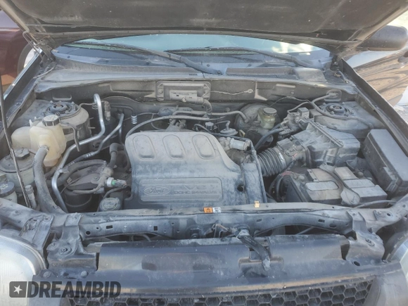 2004 Ford Escape XLS with VIN 1FMYU921X4KA14947, listed as a Copart auction lot 71589544 with 173,890 mi miles and Salvage Title. Bid and sale history available at DreamBid. Image 12.