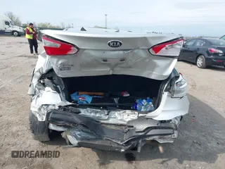 2014 Kia Forte LX with VIN KNAFX4A61E5081257, listed as a IAAI auction lot 42011042 with Not Provided miles and . Bid and sale history available at carsss.com. Image 6.