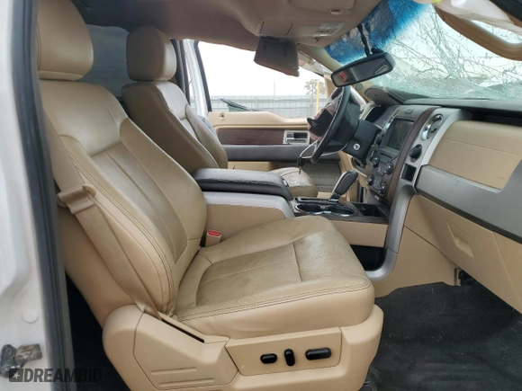 2013 Ford F-150 XLT with VIN 1FTFW1E61DFB29914, listed as a Copart auction lot 77482844 with 194,760 mi miles and Salvage Title. Bid and sale history available at carsss.com. Image 7.