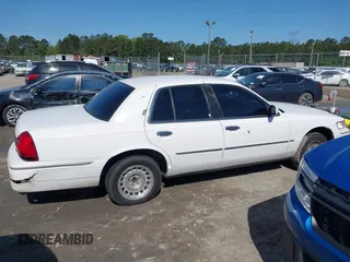 2000 Mercury Grand Marquis LS z VIN 2MEFM75W3YX689323, wystawiony jako IAAI lot #42019687 z przebiegiem 241 045 mil mil oraz . Historia ofert i sprzedaży dostępna na DreamBid. Obrazek 13.