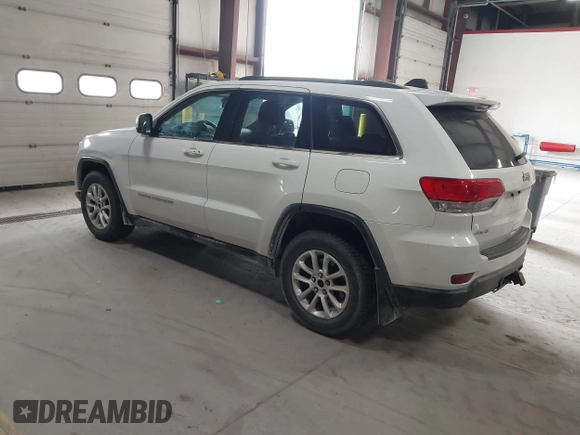 2014 Jeep Grand Cherokee Laredo with VIN 1C4RJFAG4EC309401, listed as a IAAI auction lot 41996233 with 243,541 mi miles and . Bid and sale history available at DreamBid. Image 3.