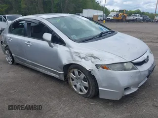 2010 Honda Civic LX with VIN 2HGFA1F59AH323381, listed as a IAAI auction lot 42181040 with 320,419 mi miles and . Bid and sale history available at DreamBid. Image 1.