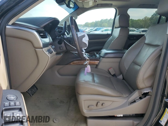 2016 Chevrolet Tahoe LTZ с VIN 1GNSCCKC0GR239540, выставлен на аукционе Copart как лот 50720995 с пробегом 129 185 миль миль и Списание • Salvage title. История ставок и продаж доступна на DreamBid. Изображение 7.