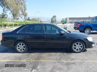 2000 Toyota Avalon XL with VIN 4T1BF28BXYU087172, listed as a IAAI auction lot 42000095 with 120,296 mi miles and . Bid and sale history available at DreamBid. Image 13.