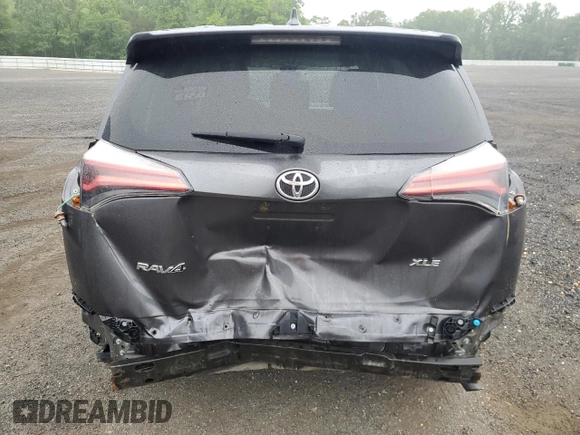 2018 Toyota RAV4 XLE with VIN 2T3WFREV0JW445322, listed as a Copart auction lot 55623845 with 116,700 mi miles and Salvage title. Bid and sale history available at DreamBid. Image 6.