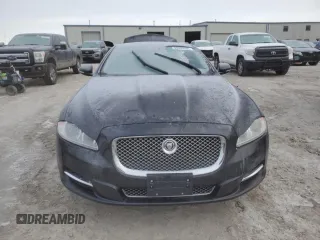 2013 Jaguar XJ with VIN SAJWA1C70D8V41578, listed as a Copart auction lot 89080585 with 76,063 mi miles and Salvage Title. Bid and sale history available at DreamBid. Image 5.