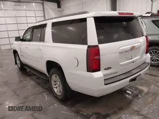 2020 Chevrolet Suburban LT with VIN 1GNSKHKC5LR108971, listed as a IAAI auction lot 41651417 with 90,674 mi miles. Bid and sale history available at carsss.com. Image 3.