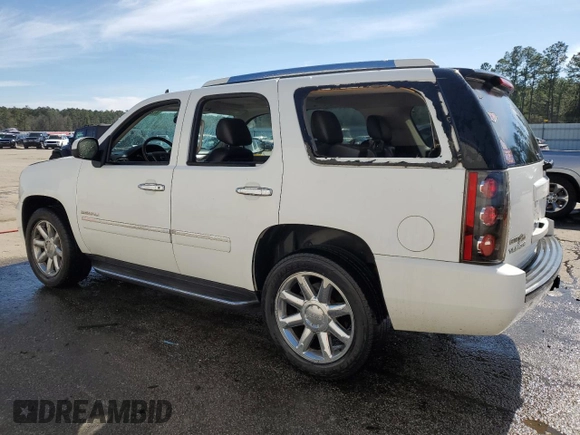 2011 GMC Yukon Denali with VIN 1GKS2EEF1BR121720, listed as a Copart auction lot 47296805 with 291,412 mi miles and Salvage Title. Bid and sale history available at carsss.com. Image 2.
