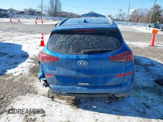 2019 Hyundai Tucson Sport with VIN KM8J33ALXKU857925, listed as a IAAI auction lot 41369786 with 41,365 mi miles. Bid and sale history available at carsss.com. Image 16.