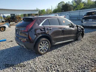 2021 Cadillac XT4 FWD Premium Luxury z VIN 1GYFZCR45MF002654, wystawiony jako Copart lot #52288105 z przebiegiem Nie podano mil oraz Szkody całkowita. Historia ofert i sprzedaży dostępna na DreamBid. Obrazek 3.