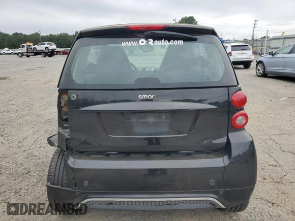 2014 Smart fortwo Pure z VIN WMEEJ3BA2EK733447, wystawiony jako Copart lot #53882735 z przebiegiem Nie podano mil oraz Tytuł czysty. Historia ofert i sprzedaży dostępna na DreamBid. Obrazek 6.