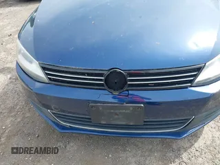 2013 Volkswagen Jetta SE z VIN 3VWDP7AJ0DM292598, wystawiony jako IAAI lot #42360798 z przebiegiem 169 885 mil mil oraz . Historia ofert i sprzedaży dostępna na DreamBid. Obrazek 14.