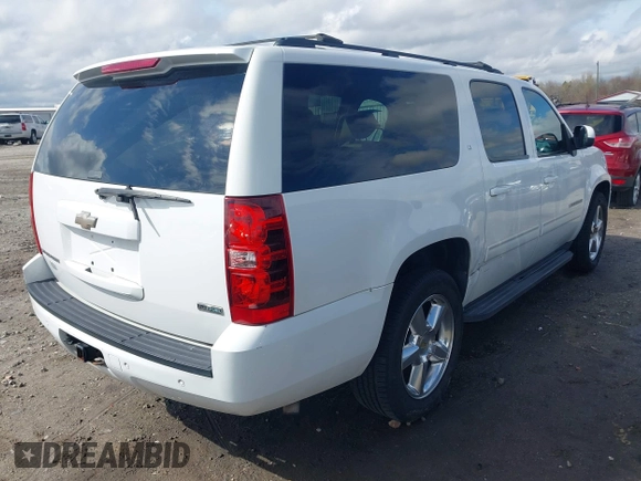 2011 Chevrolet Suburban LT with VIN 1GNSCJE01BR291466, listed as a IAAI auction lot 41800799 with 232,542 mi miles. Bid and sale history available at carsss.com. Image 4.