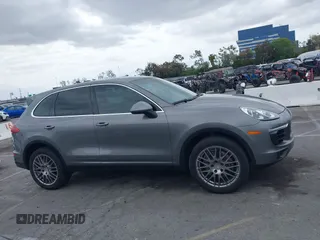 2016 Porsche Cayenne with VIN WP1AA2A27GKA15797, listed as a IAAI auction lot 42063043 with 81,464 mi miles. Bid and sale history available at carsss.com. Image 13.