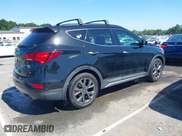 2018 Hyundai Santa Fe Ultimate with VIN 5NMZW4LA4JH054307, listed as a IAAI auction lot 42532426 with 148,299 mi miles and . Bid and sale history available at DreamBid. Image 4.