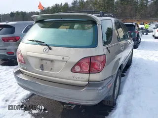 1999 Lexus RX 300 Luxury SUV with VIN JT6HF10U1X0088942, listed as a IAAI auction lot 41471680 with 193,592 mi miles. Bid and sale history available at carsss.com. Image 4.