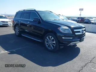 2014 Mercedes-Benz GL 450 z VIN 4JGDF7CE3EA268053, wystawiony jako IAAI lot #42298812 z przebiegiem 126 150 mil mil oraz . Historia ofert i sprzedaży dostępna na DreamBid. Obrazek 1.