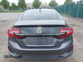 2018 Honda Clarity Touring z VIN JHMZC5F3XJC001054, wystawiony jako IAAI lot #42292688 z przebiegiem 60 780 mil mil oraz . Historia ofert i sprzedaży dostępna na DreamBid. Obrazek 16.