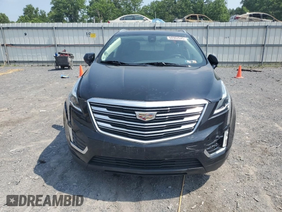 2019 Cadillac XT5 Premium Luxury AWD with VIN 1GYKNFRS9KZ223065, listed as a Copart auction lot 60902645 with 101,168 mi miles and Salvage title. Bid and sale history available at DreamBid. Image 5.