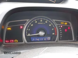 2010 Honda Civic LX-S z VIN 19XFA1F60AE070633, wystawiony jako IAAI lot #42205266 z przebiegiem 217 467 mil mil oraz . Historia ofert i sprzedaży dostępna na DreamBid. Obrazek 7.