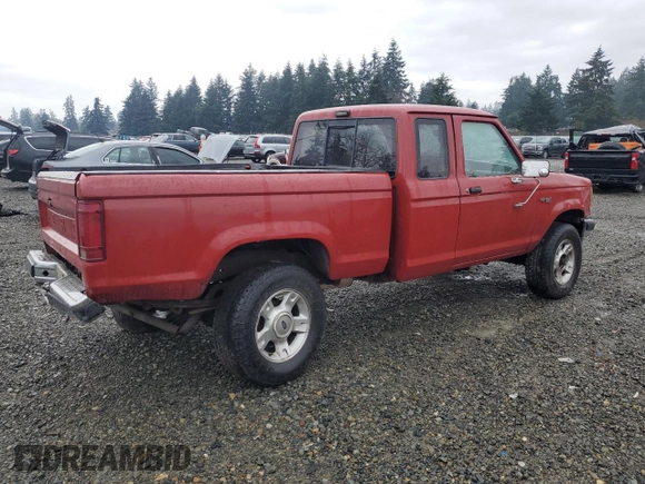 1990 Ford Ranger XLT with VIN 1FTCR15X6LPB44730, listed as a Copart auction lot 87076334 with 91,204 mi miles and Salvage Title. Bid and sale history available at DreamBid. Image 3.