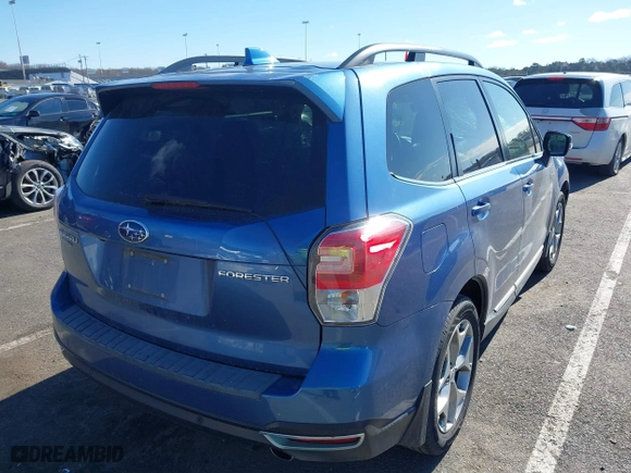 2018 Subaru Forester Touring with VIN JF2SJAWCXJH467976, listed as a IAAI auction lot 41744472 with 98,919 mi miles. Bid and sale history available at carsss.com. Image 4.