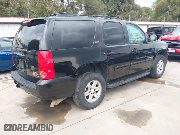 2014 GMC Yukon SLT with VIN 1GKS1CE07ER229525, listed as a IAAI auction lot 40260080 with 180,043 mi miles. Bid and sale history available at carsss.com. Image 4.