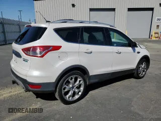 2016 Ford Escape Titanium with VIN 1FMCU0J99GUB83458, listed as a Copart auction lot 48828195 with 74,250 mi miles and Salvage Title. Bid and sale history available at carsss.com. Image 3.