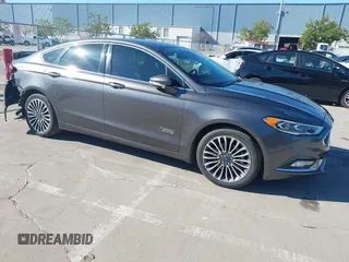 2018 Ford Fusion Energi Titanium with VIN 3FA6P0SU5JR111012, listed as a IAAI auction lot 41862545 with 223,209 mi miles. Bid and sale history available at carsss.com. Image 1.