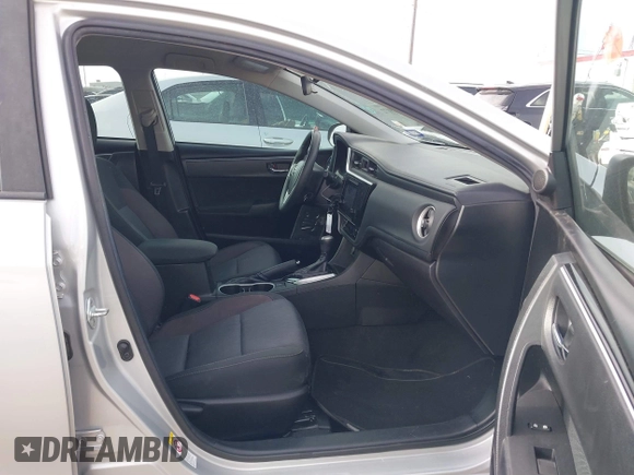 2018 Toyota Corolla L z VIN 5YFBURHE2JP831394, wystawiony jako IAAI lot #41689172 z przebiegiem 74 985 mil mil oraz . Historia ofert i sprzedaży dostępna na DreamBid. Obrazek 5.