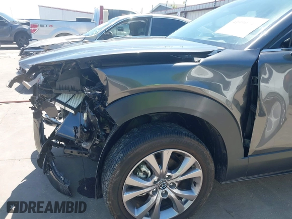 2022 Mazda CX-30 S Premium with VIN 3MVDMBDL5NM416649, listed as a IAAI auction lot 41990745 with 13,923 mi miles and . Bid and sale history available at DreamBid. Image 19.