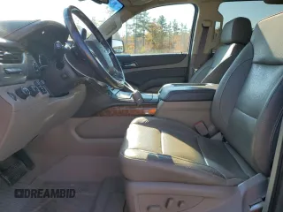 2019 Chevrolet Suburban Premier with VIN 1GNSKJKC6KR293389, listed as a Copart auction lot 77700264 with 49,057 mi miles and Salvage Title. Bid and sale history available at DreamBid. Image 7.