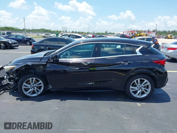 2017 Infiniti QX30 Premium with VIN SJKCH5CP5HA016631, listed as a IAAI auction lot 42355185 with 115,778 mi miles and . Bid and sale history available at DreamBid. Image 14.