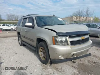 2014 Chevrolet Tahoe LT z VIN 1GNSKBE07ER199226, wystawiony jako IAAI lot #42094438 z przebiegiem 191 387 mil mil oraz . Historia ofert i sprzedaży dostępna na DreamBid. Obrazek 1.