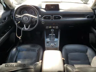 2018 Mazda CX-5 Grand Touring with VIN JM3KFADM5J0325794, listed as a Copart auction lot 79748544 with 106,781 mi miles and Salvage Title. Bid and sale history available at carsss.com. Image 8.