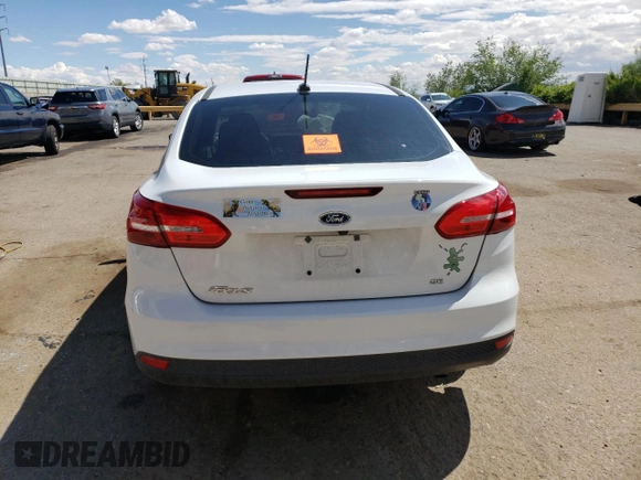 2017 Ford Focus SE with VIN 1FADP3F21HL300654, listed as a Copart auction lot 55987305 with Not provided miles and Salvage title. Bid and sale history available at DreamBid. Image 6.