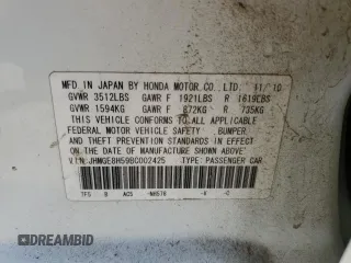 2011 Honda Fit Sport z VIN JHMGE8H59BC002425, wystawiony jako Copart lot #69977564 z przebiegiem 137 729 mil mil oraz Szkoda całkowita • Salvage title. Historia ofert i sprzedaży dostępna na DreamBid. Obrazek 14.