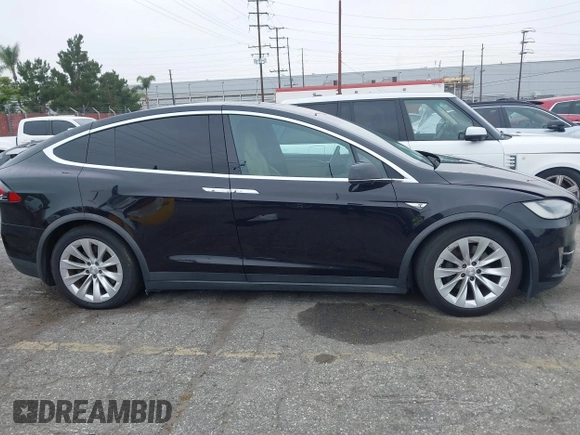 2016 Tesla Model X 70D with VIN 5YJXCBE2XGF019095, listed as a IAAI auction lot 42025230 with 109,660 mi miles and . Bid and sale history available at DreamBid. Image 13.