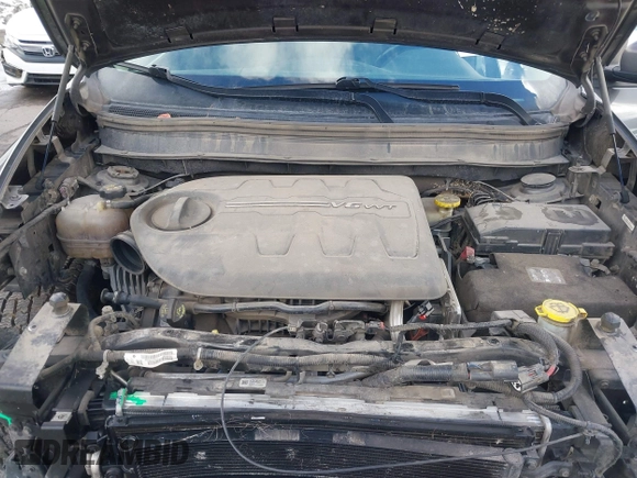 2015 Jeep Cherokee Trailhawk with VIN 1C4PJMBS9FW785545, listed as a IAAI auction lot 41573197 with 124,304 mi miles. Bid and sale history available at carsss.com. Image 10.