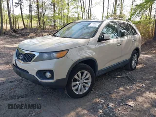 2011 Kia Sorento EX with VIN 5XYKU4A27BG011773, listed as a IAAI auction lot 42085204 with 292,692 mi miles. Bid and sale history available at carsss.com. Image 2.
